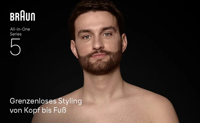 Bärtiger Mann nach der Verwendung des Braun All-in-One Series 5 für das Styling von Kopf bis Fuß.